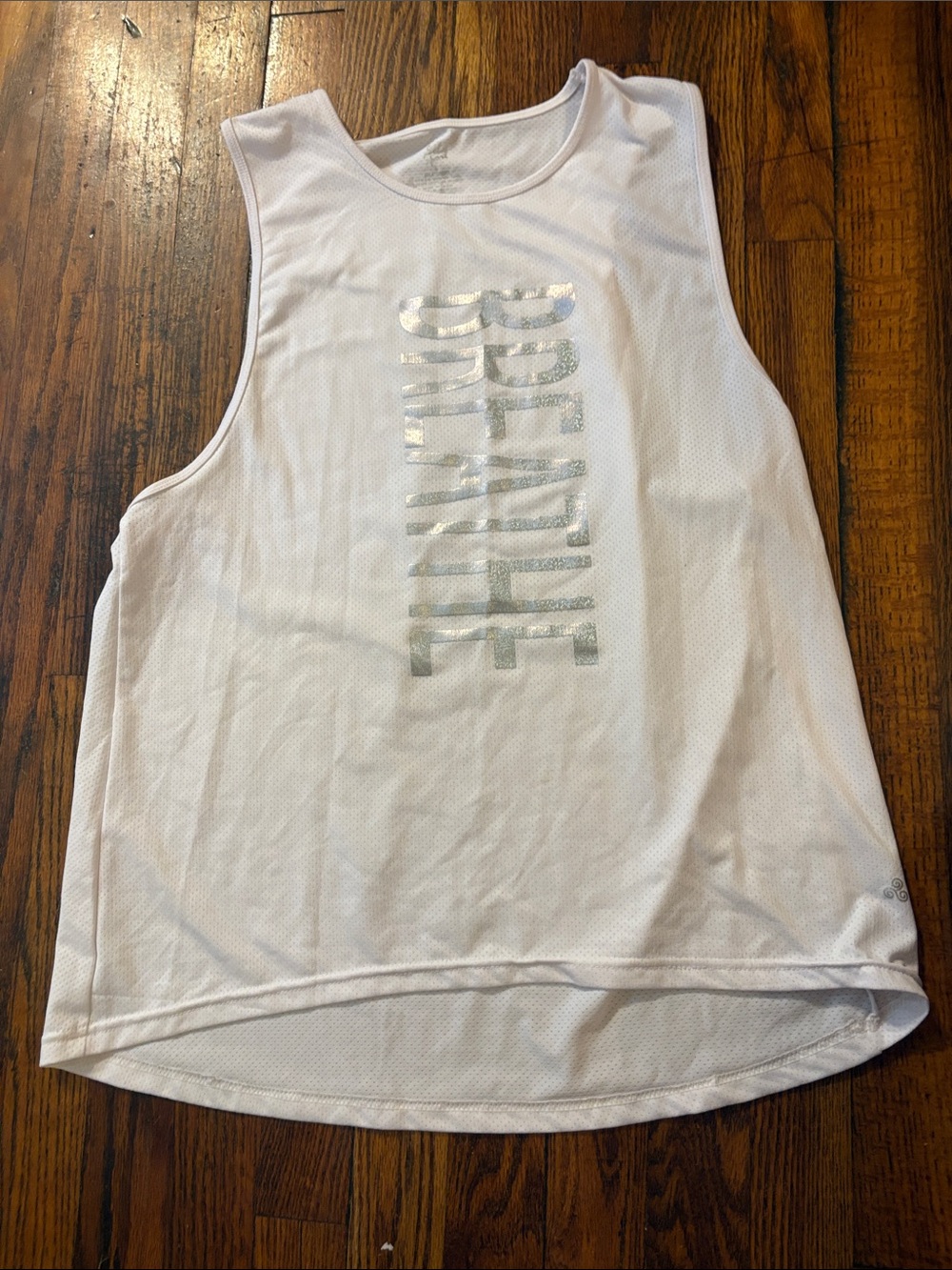 White Sleeveless Athletic Tank with Silver Vertical Logo Accent